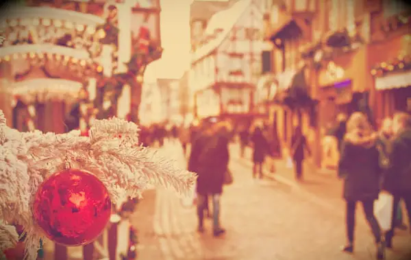 People out in a city during Christmas time.