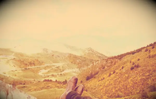 An image of someone relaxing in the mountains.